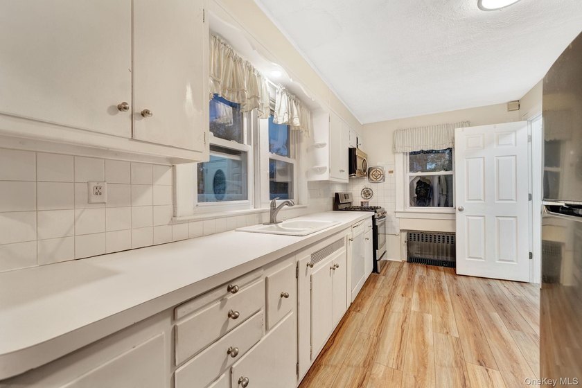 Filled with warmth and opportunity, this 3 bedroom, 1 bath Cape - photo 17
