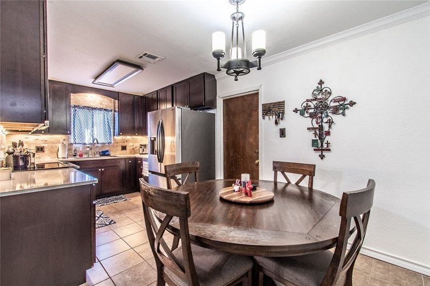 Welcome to this charming 3-bedroom, 2-bath home in the highly - photo 11