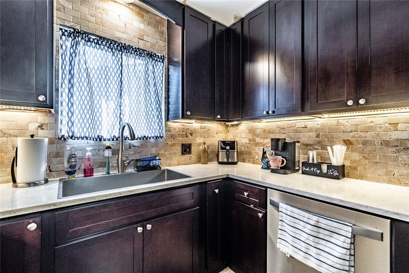 Welcome to this charming 3-bedroom, 2-bath home in the highly - photo 16