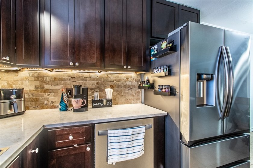 Welcome to this charming 3-bedroom, 2-bath home in the highly - photo 17