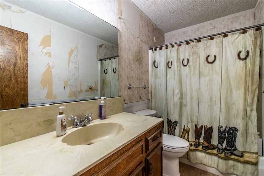 Welcome to this charming 3-bedroom, 2-bath home in the highly - photo 23