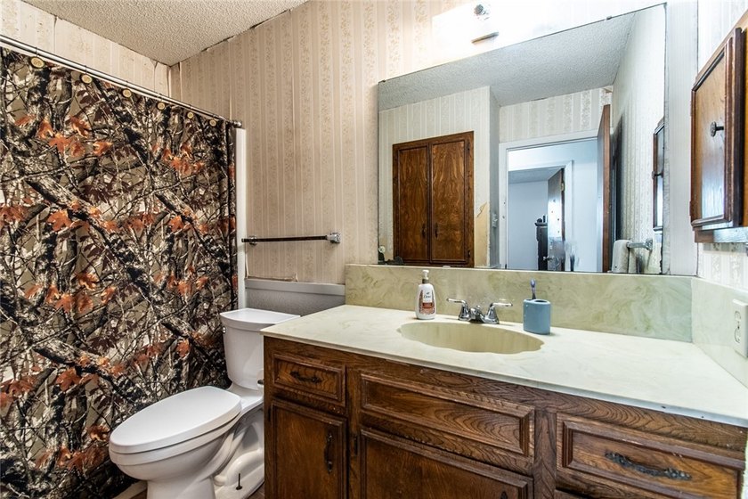 Welcome to this charming 3-bedroom, 2-bath home in the highly - photo 26