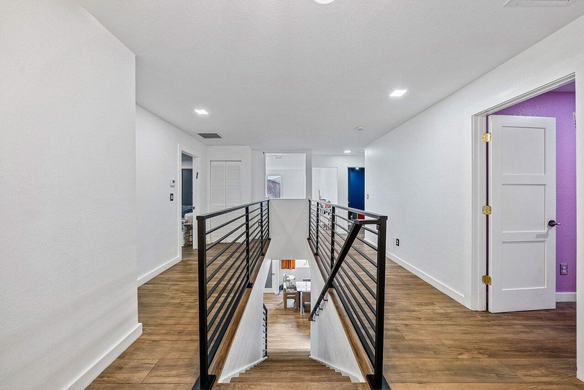 A beautiful 5 BD 3 BA two-story home in Boca Vistas with chic - photo 15