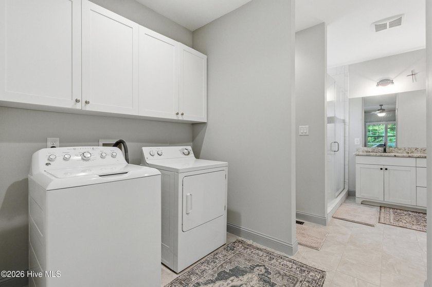 Custom-built and thoughtfully designed, this beautiful home - photo 17