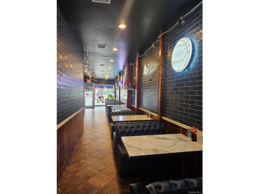 It is located in Bayside's main business district. Bell Blvd in - photo 9