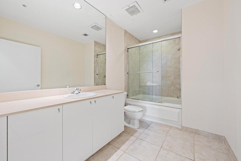 2 parking spaces PLUS valet! Penthouse-level living with 10' - photo 12
