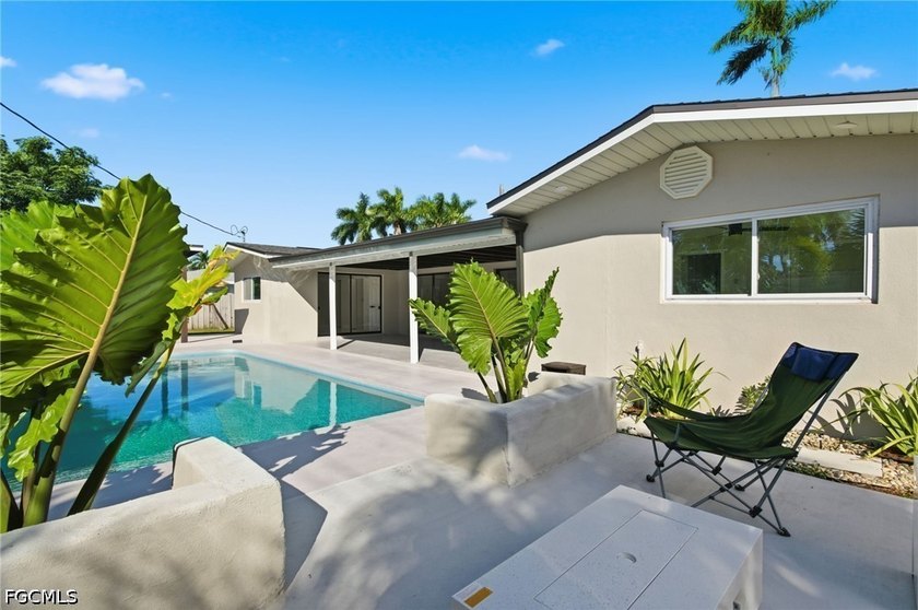 Welcome to this beautifully renovated pool home in the highly - photo 14