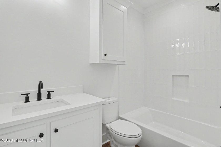 Welcome to this stunning new construction waterfront home! This - photo 13