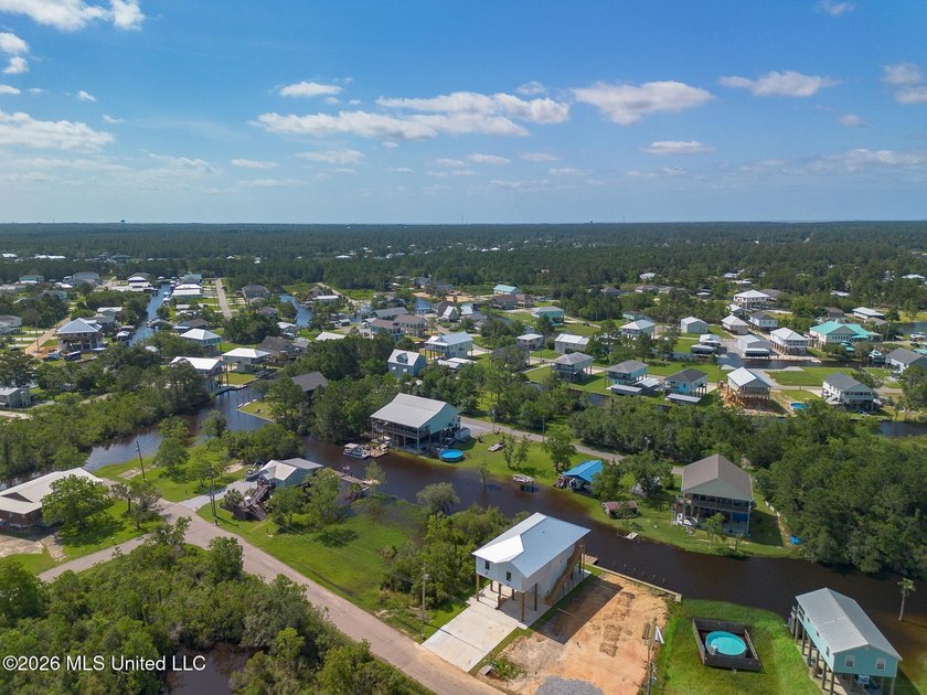 Welcome to this stunning new construction waterfront home! This - photo 30