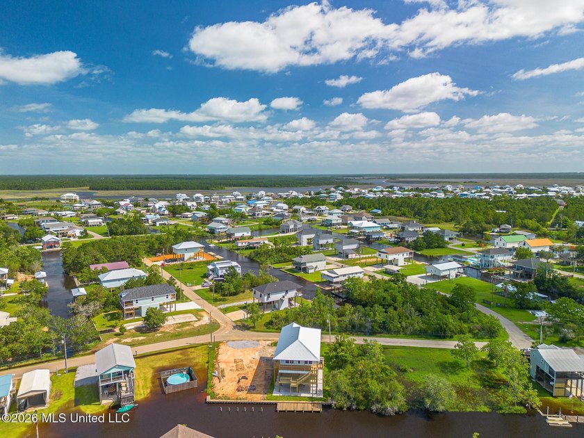 Welcome to this stunning new construction waterfront home! This - photo 31