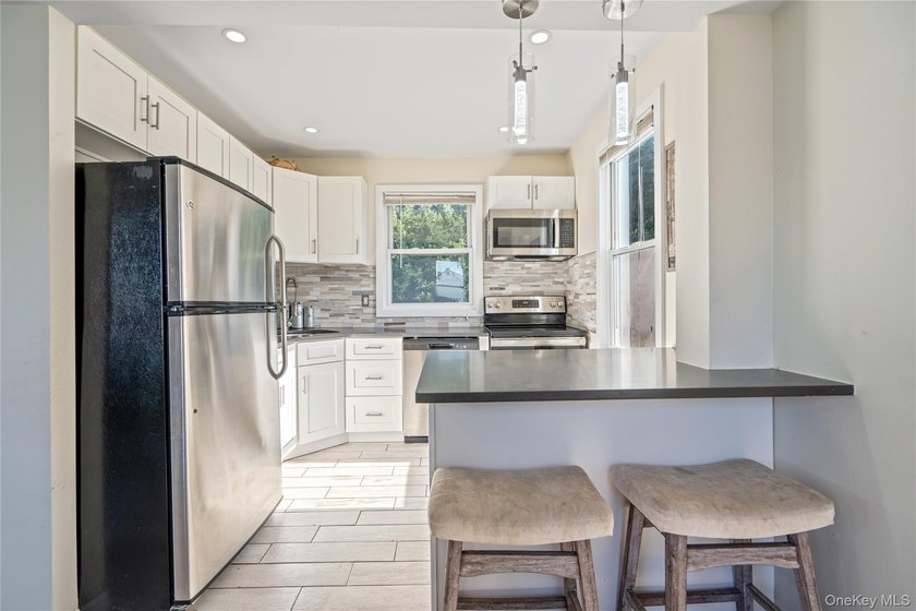 Welcome to 48 Farmers Avenue in Lindenhurst. A Charming and - photo 14