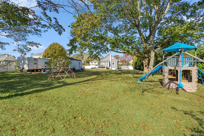 Welcome to 48 Farmers Avenue in Lindenhurst. A Charming and - photo 24