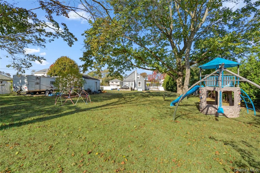 Welcome to 48 Farmers Avenue in Lindenhurst. A Charming and - photo 25