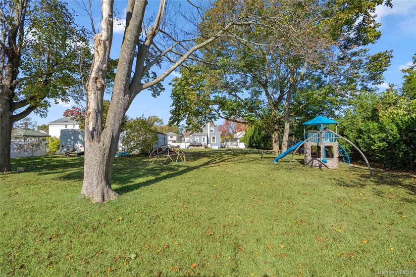 Welcome to 48 Farmers Avenue in Lindenhurst. A Charming and - photo 26