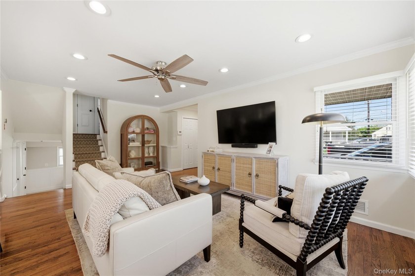 Set in the heart of West Islip, this beautifully updated - photo 2
