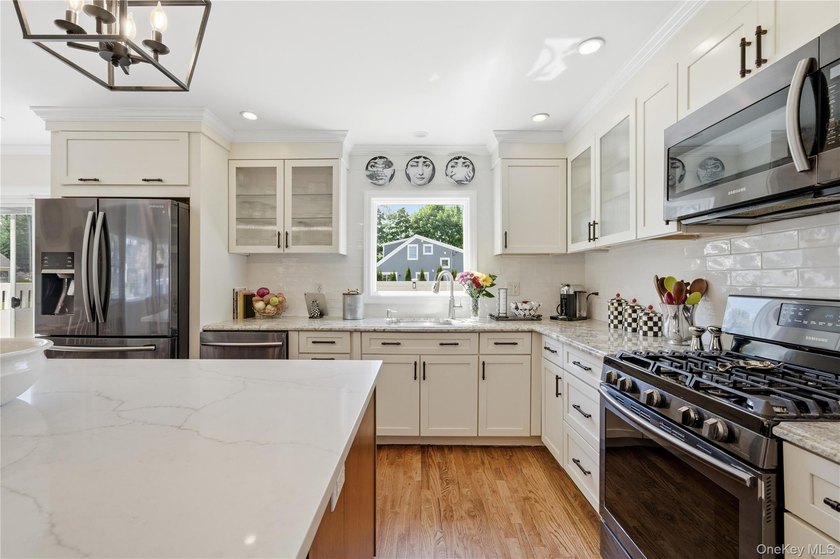 Set in the heart of West Islip, this beautifully updated - photo 6