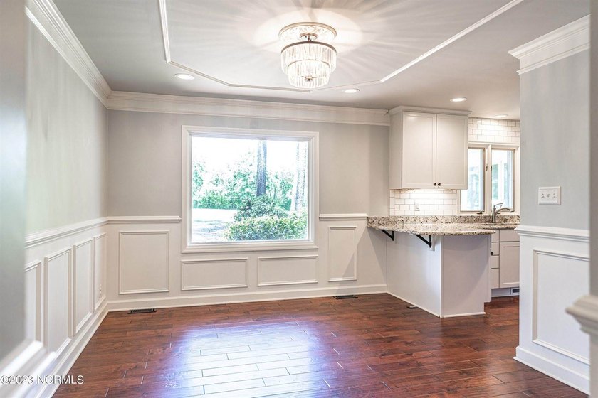 This beautiful, renovated ranch home is ideally situated on the - photo 7