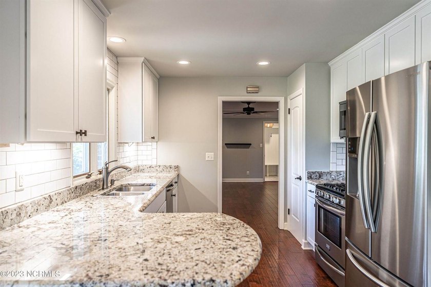 This beautiful, renovated ranch home is ideally situated on the - photo 9