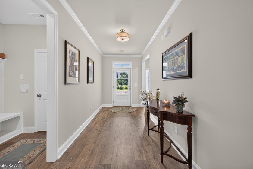 Luxury Living in a Vibrant 55+ Community Experience the perfect - photo 3