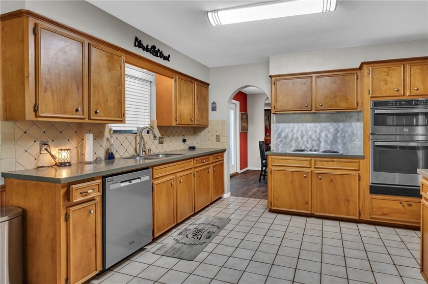 Welcome to this well-maintained 4-bedroom, 2-bath home in the - photo 16