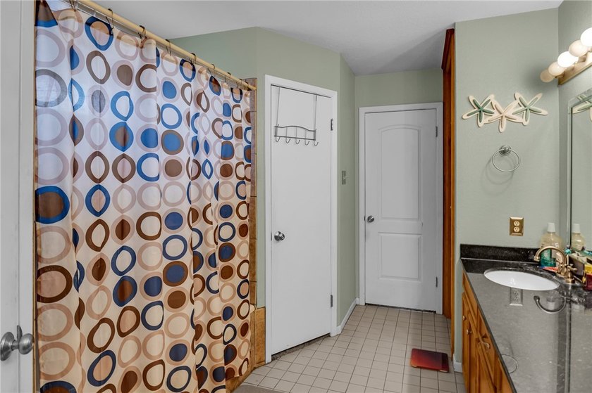 Welcome to this well-maintained 4-bedroom, 2-bath home in the - photo 20