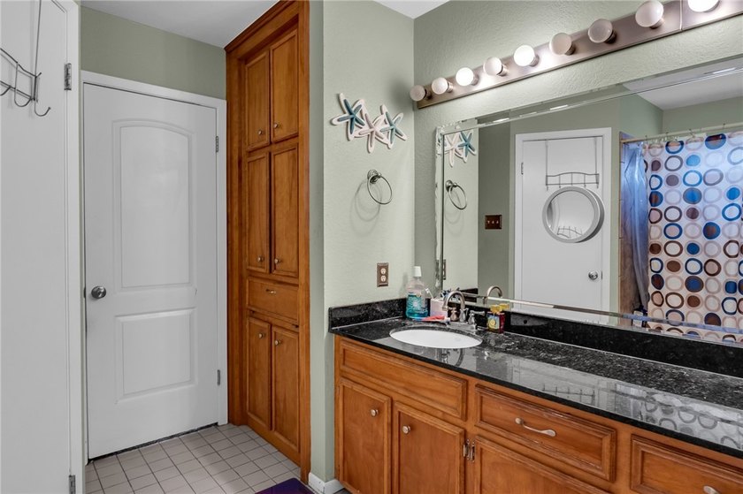 Welcome to this well-maintained 4-bedroom, 2-bath home in the - photo 21