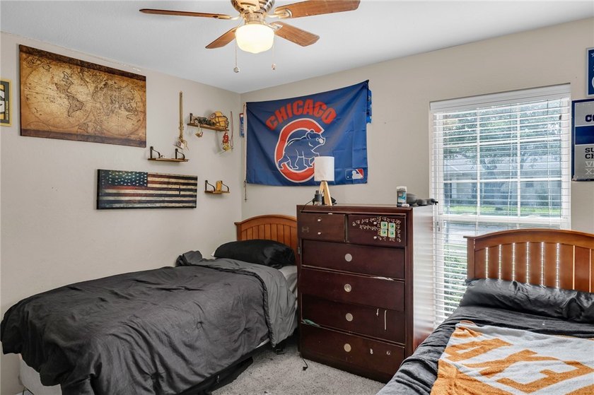 Welcome to this well-maintained 4-bedroom, 2-bath home in the - photo 23