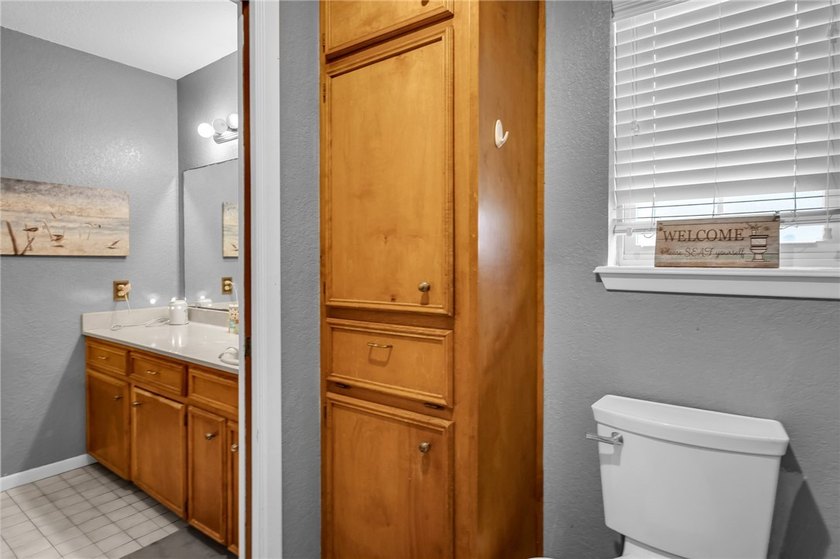 Welcome to this well-maintained 4-bedroom, 2-bath home in the - photo 27