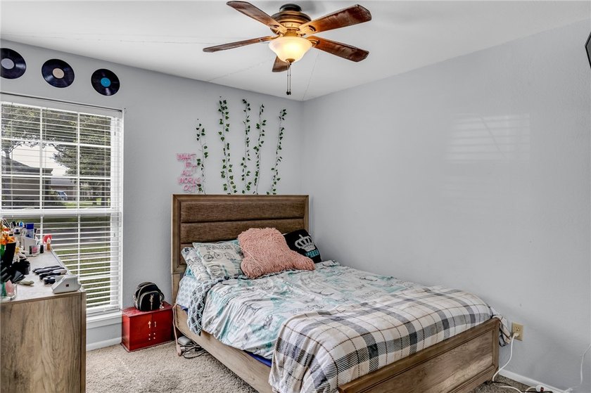 Welcome to this well-maintained 4-bedroom, 2-bath home in the - photo 29