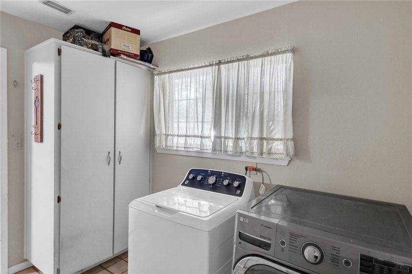 Welcome to this well-maintained 4-bedroom, 2-bath home in the - photo 32