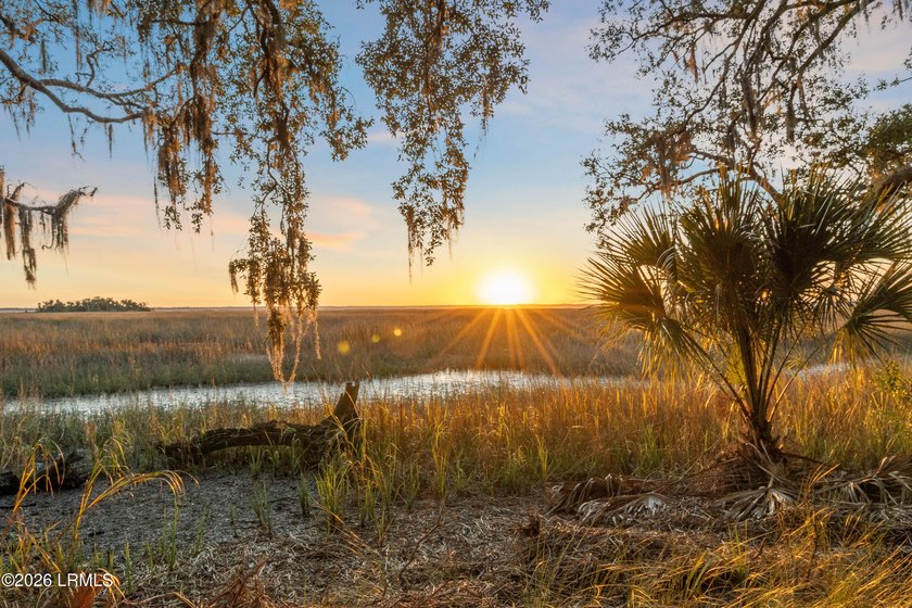 Rare and beautiful marsh-front lot now available with sweeping - photo 2