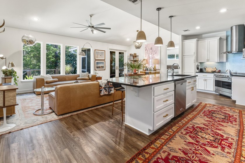 Enjoy canal-front living in this 3BR/3BA home located in - photo 3