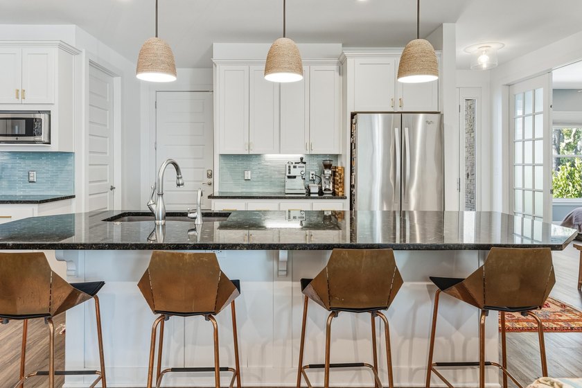 Enjoy canal-front living in this 3BR/3BA home located in - photo 8