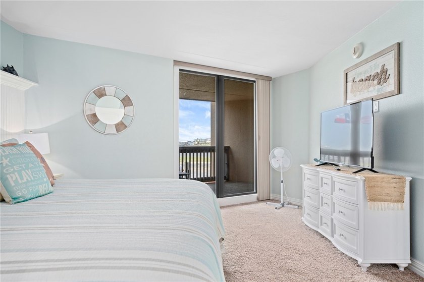 Wake up to sweeping Gulf views in this beautifully renovated - photo 20