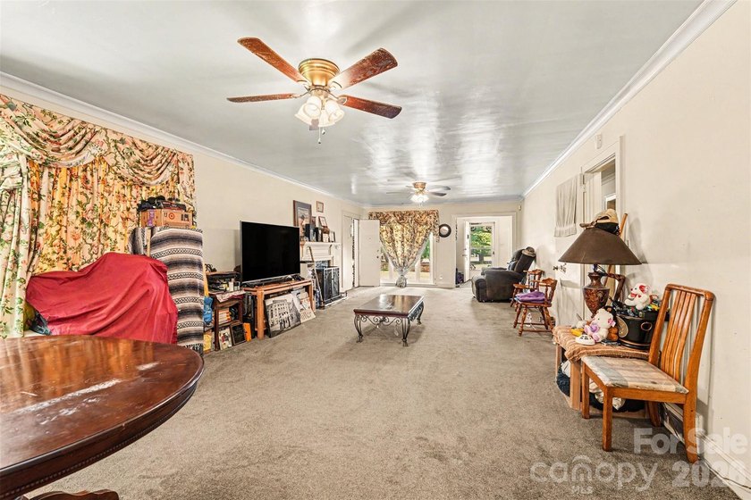 Discover the lasting value of this 3BD/3BA brick home on a rare - photo 4