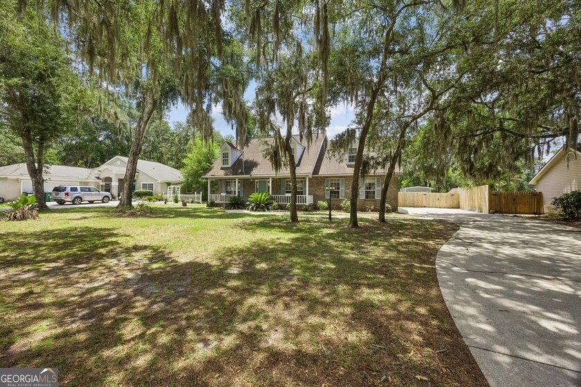 Photos will be uploaded 06/27--- Beautiful two-story brick home - photo 2