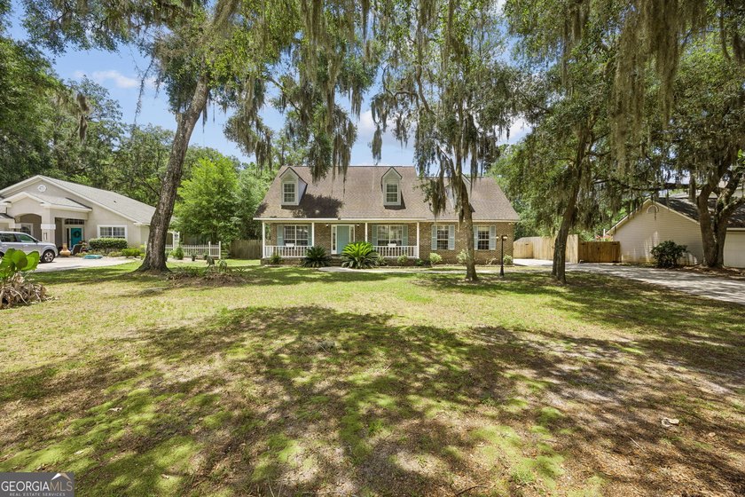 Photos will be uploaded 06/27--- Beautiful two-story brick home - photo 3