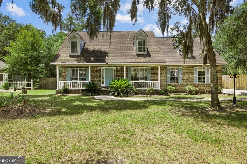 Photos will be uploaded 06/27--- Beautiful two-story brick home - photo 6