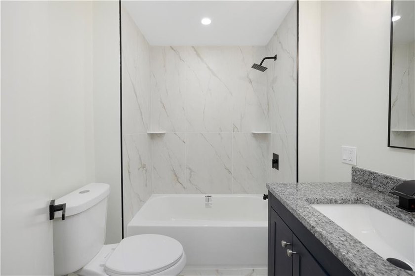 Welcome to your dream home at 2 Birch Street, a charming and - photo 19