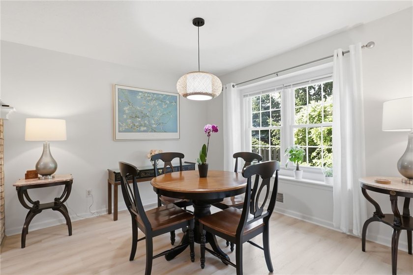 Welcome to this sparkling, move-in ready end-unit townhome in - photo 5
