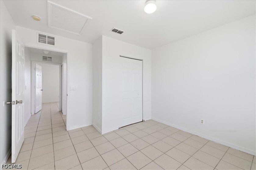 3-bedroom, 2-bath home offering an open-concept layout with tile - photo 22