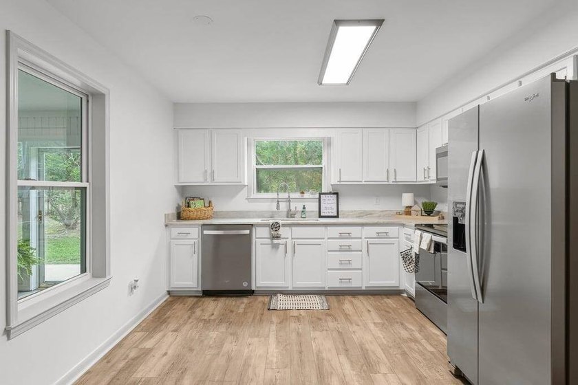 Welcome to this beautifully updated 4-bedroom, 2-bath home with - photo 11