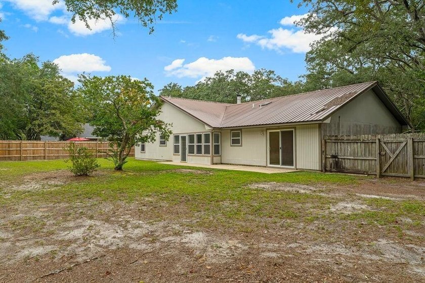 Welcome to this beautifully updated 4-bedroom, 2-bath home with - photo 30