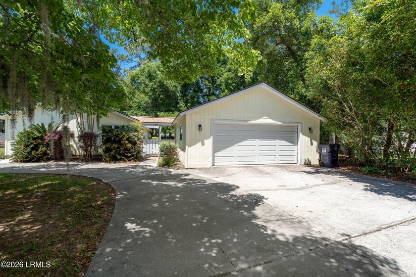Nestled on a spacious corner lot in a private cul-de-sac, this - photo 4
