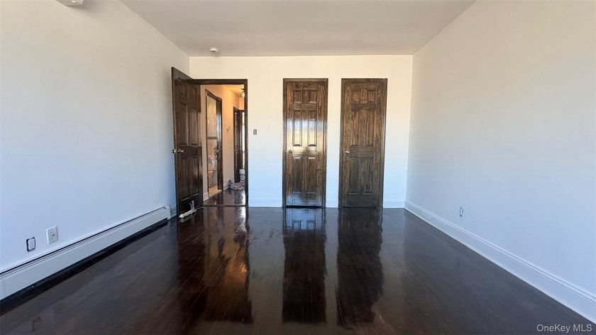 This charming one-family home offers three bedrooms, two and a - photo 11
