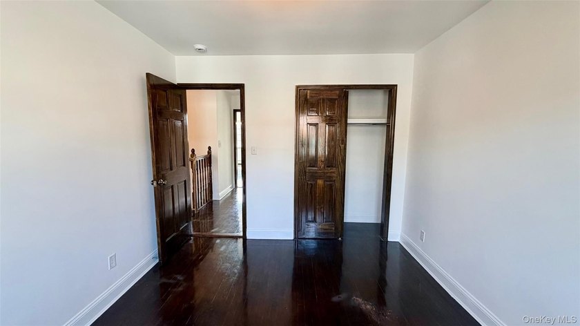 This charming one-family home offers three bedrooms, two and a - photo 13