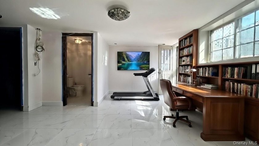 This charming one-family home offers three bedrooms, two and a - photo 17