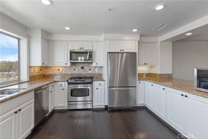 Welcome to luxury coastal living in the prestigious Bay Club - photo 20