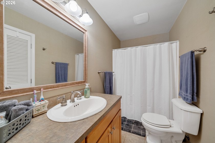 This one level home spans 1,757 square feet and features four - photo 20