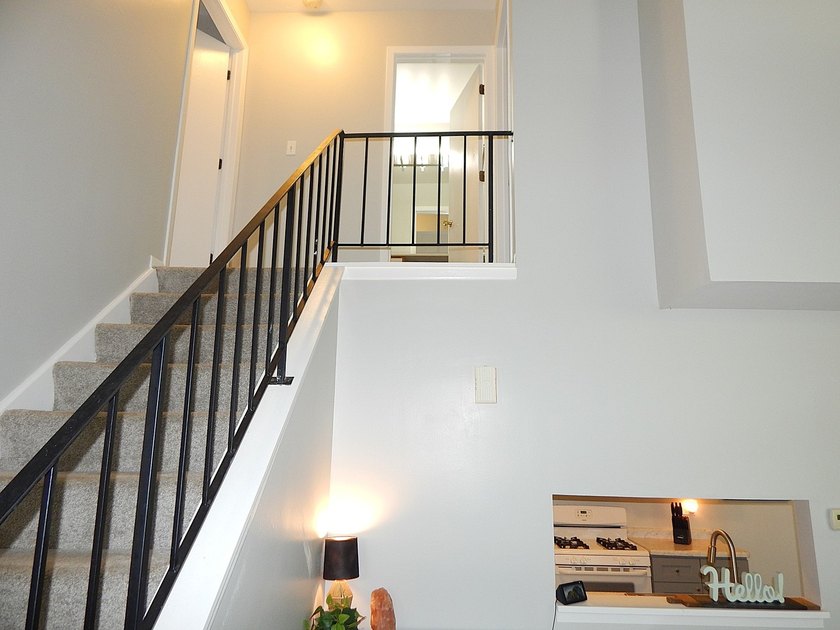 This immaculate end-unit townhome offers 2 bedrooms, 1 1/2 baths - photo 2